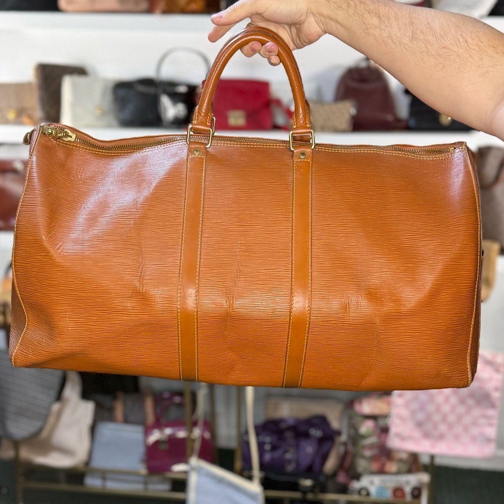 LV EPI TRAVEL BAG